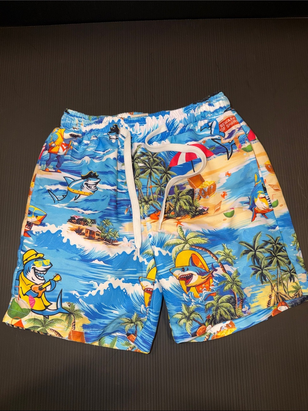 Boys Blue Tropical Shark Print Swim Trunks